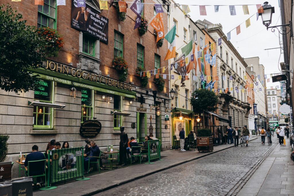 Lively street scene at Temple Bar, Dublin showcasing local culture and architecture.