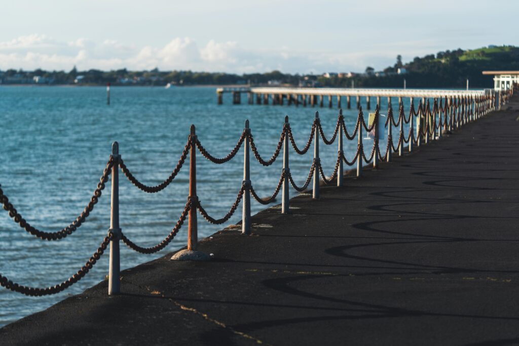 Bright day at a picturesque pier overlooking the harbor in Auckland, New Zealand.