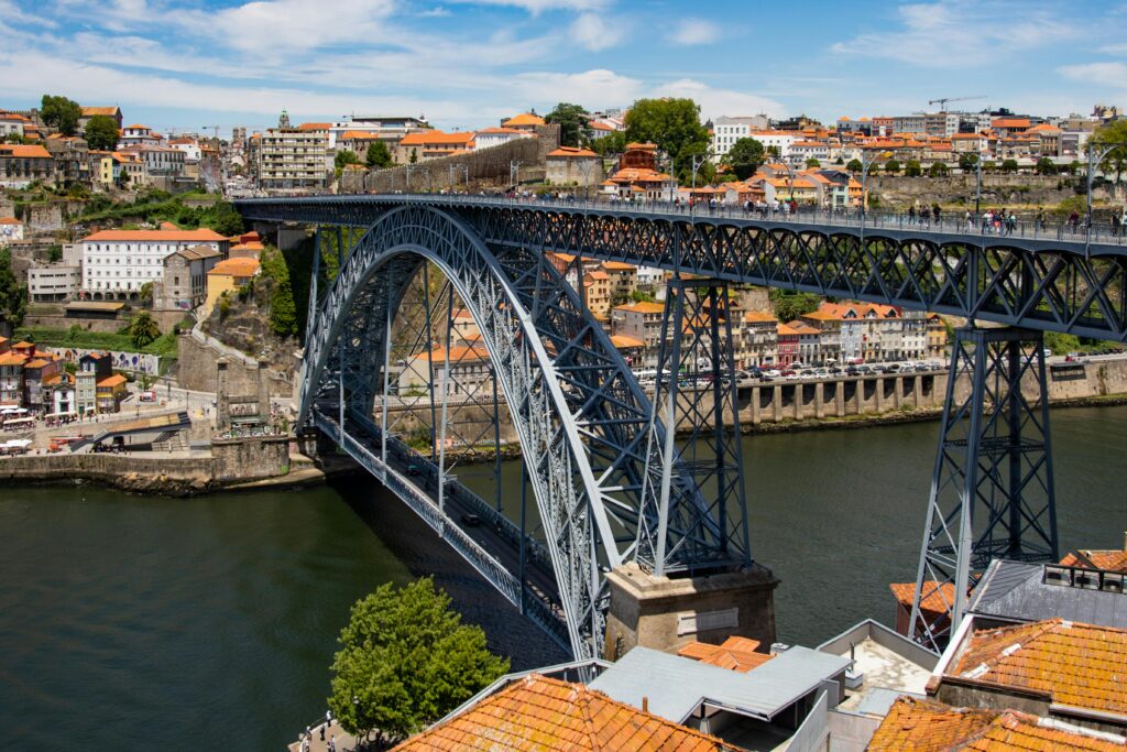 Scenic view of the Dom LuÃs I Bridge spanning the Douro River in Porto, Portugal.